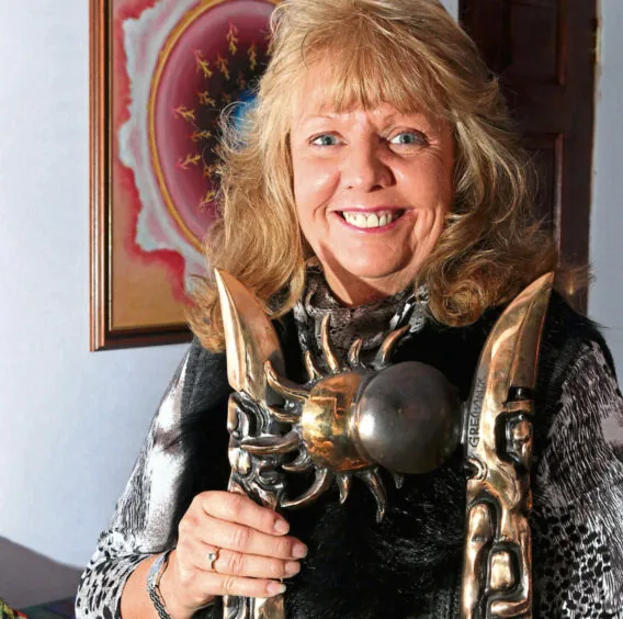 June Field holding her trophy